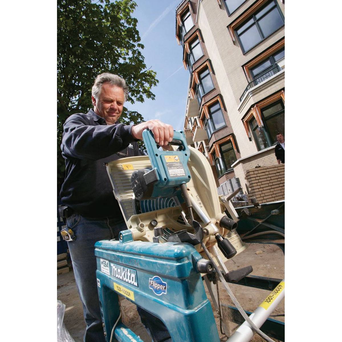 SCIE À COUPE D'ONGLETS ET DÉLIGNAGE RÉVERSIBLE MAKITA Ø 260 MM - 1650 W